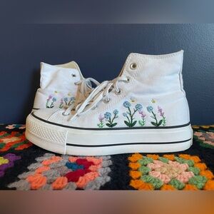 White hand-embroidered converse